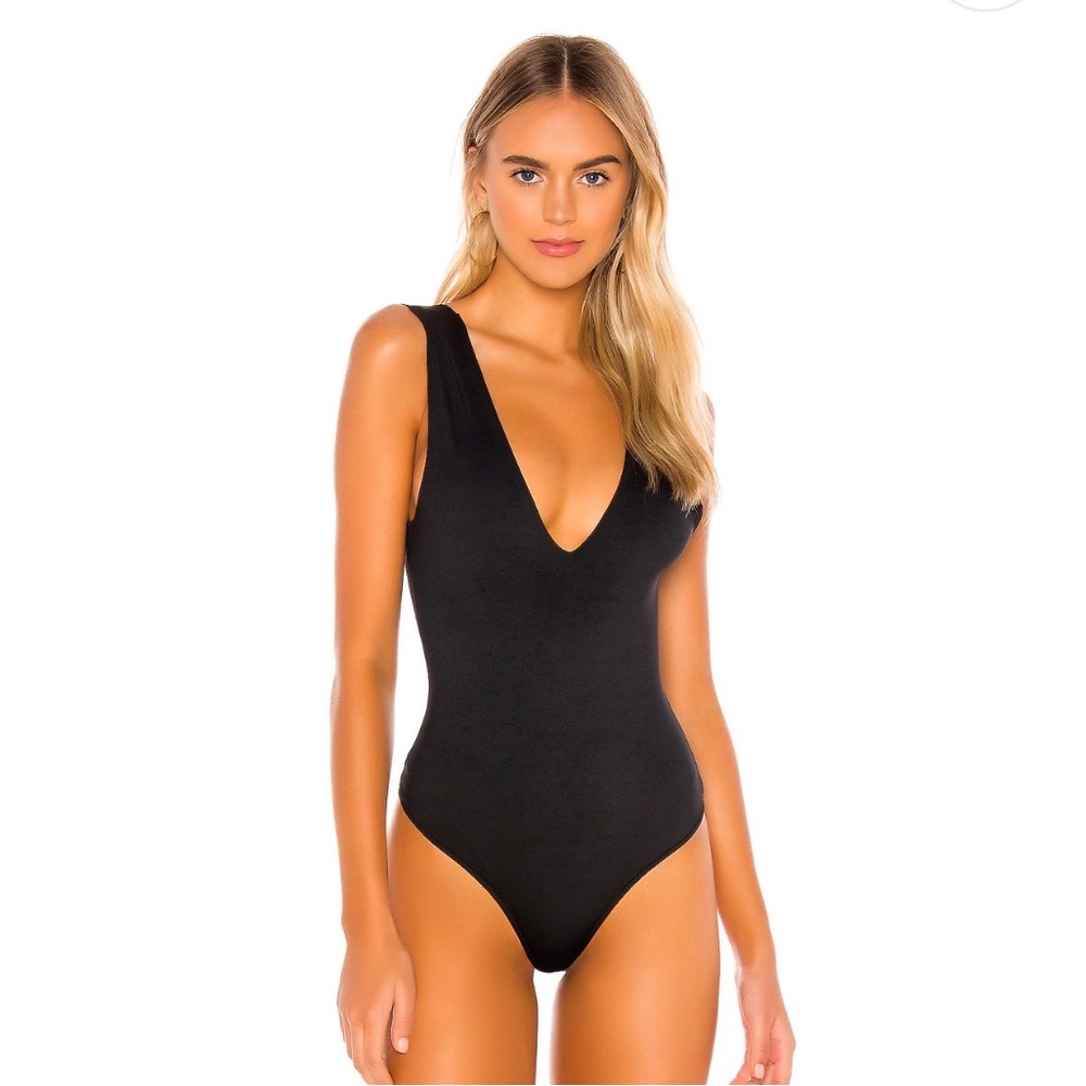 Black V Bodysuit from Free People. Size Small. Never worn